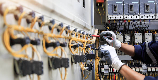 Professional Electrician technician working in Spanish Fort, AL